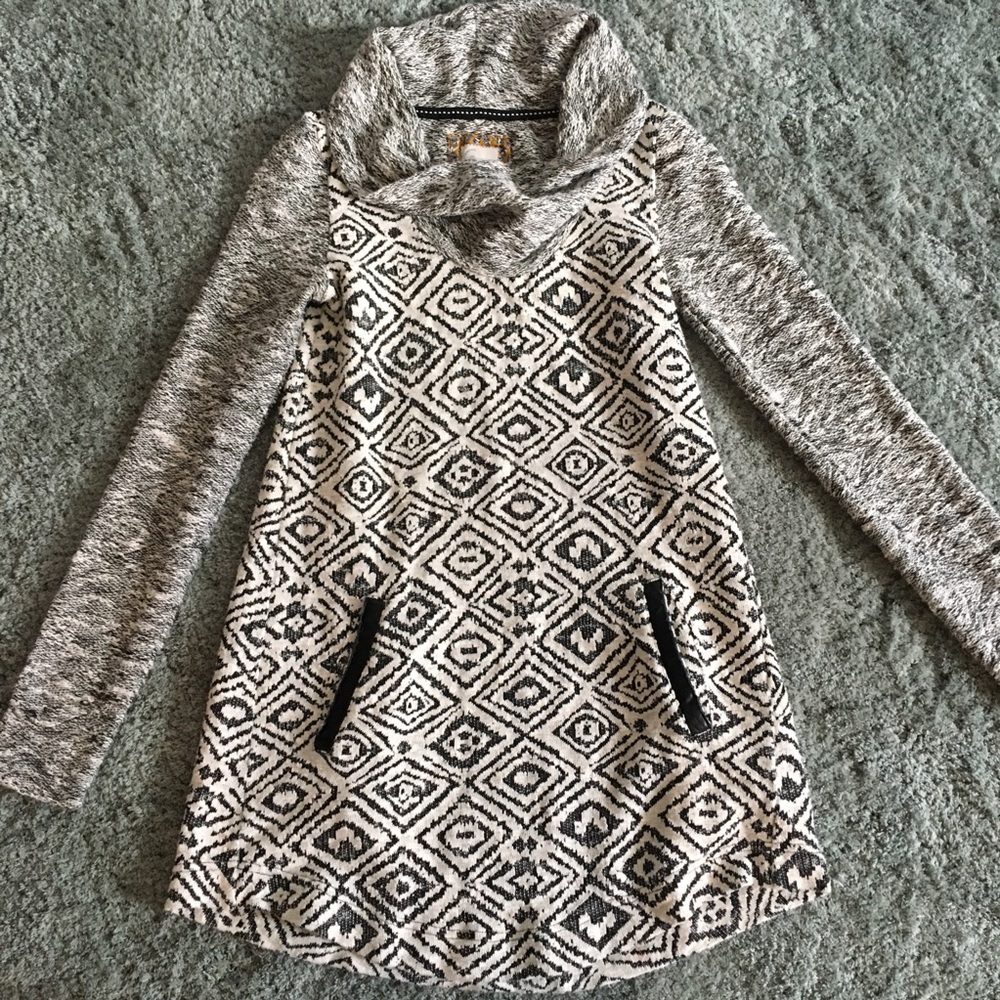 Gray, long sweater.